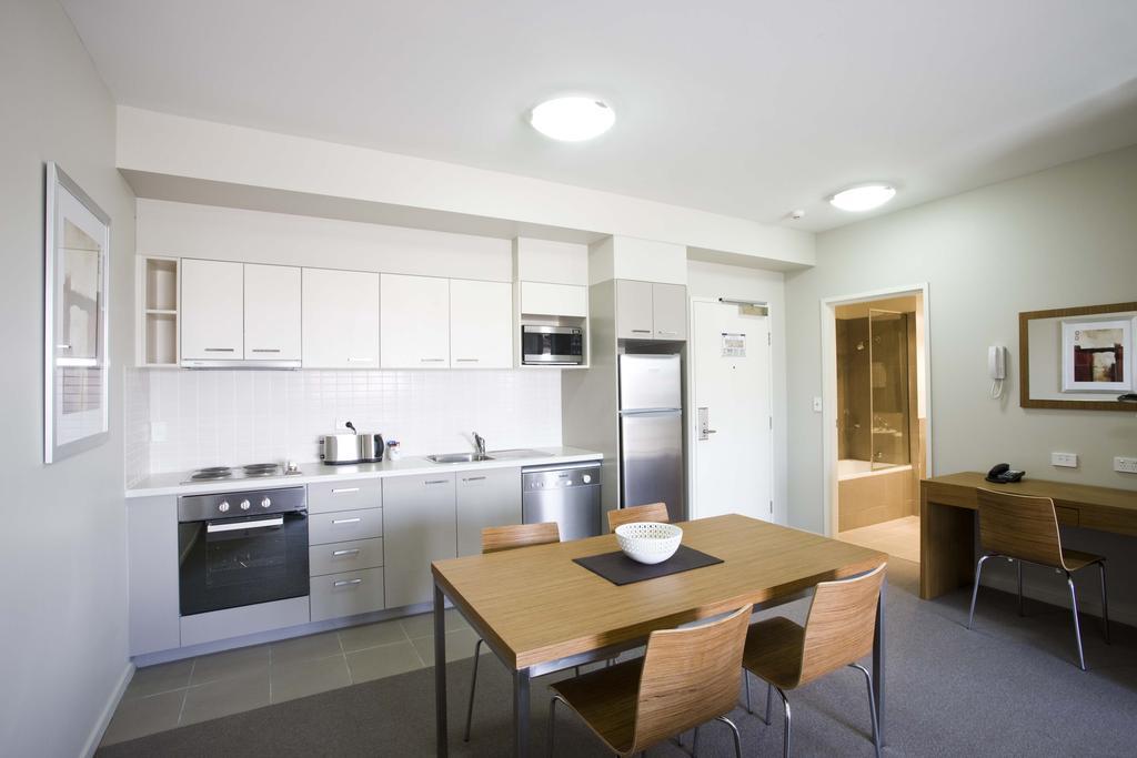 Gladstone Downtown Central Apartment Hotel Official Номер фото